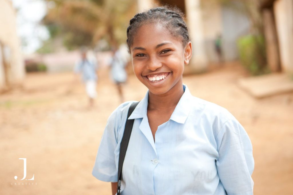 student smiling at the camera