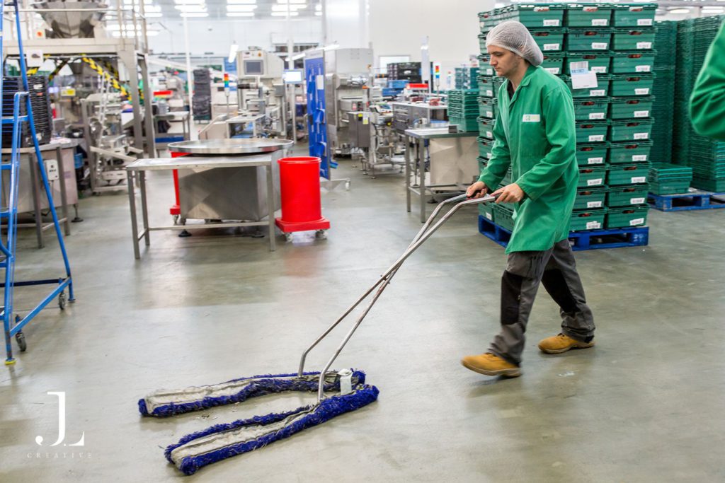 employee mopping the floor