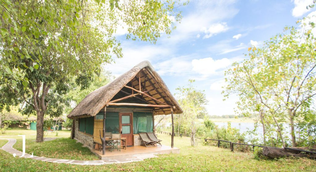 Private safari lodge deck overlooking the river at Mvuu Malawi