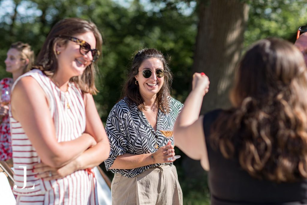 Guests networking during Belmond luxury travel retreat at Knepp Estate