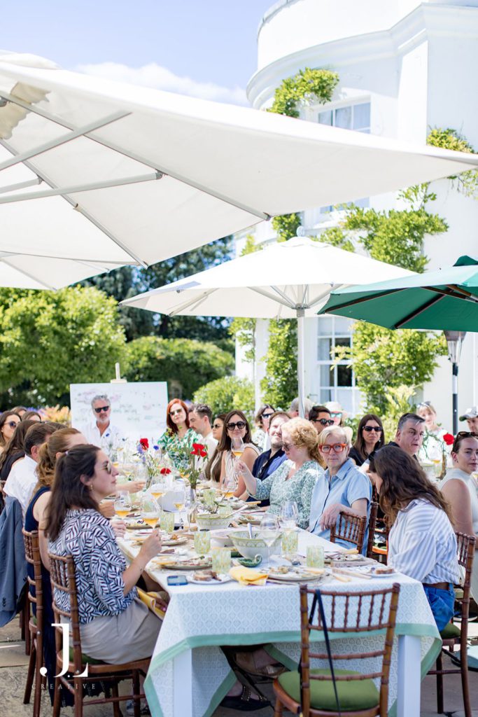 Guests enjoying countryside dining during Belmond luxury retreat