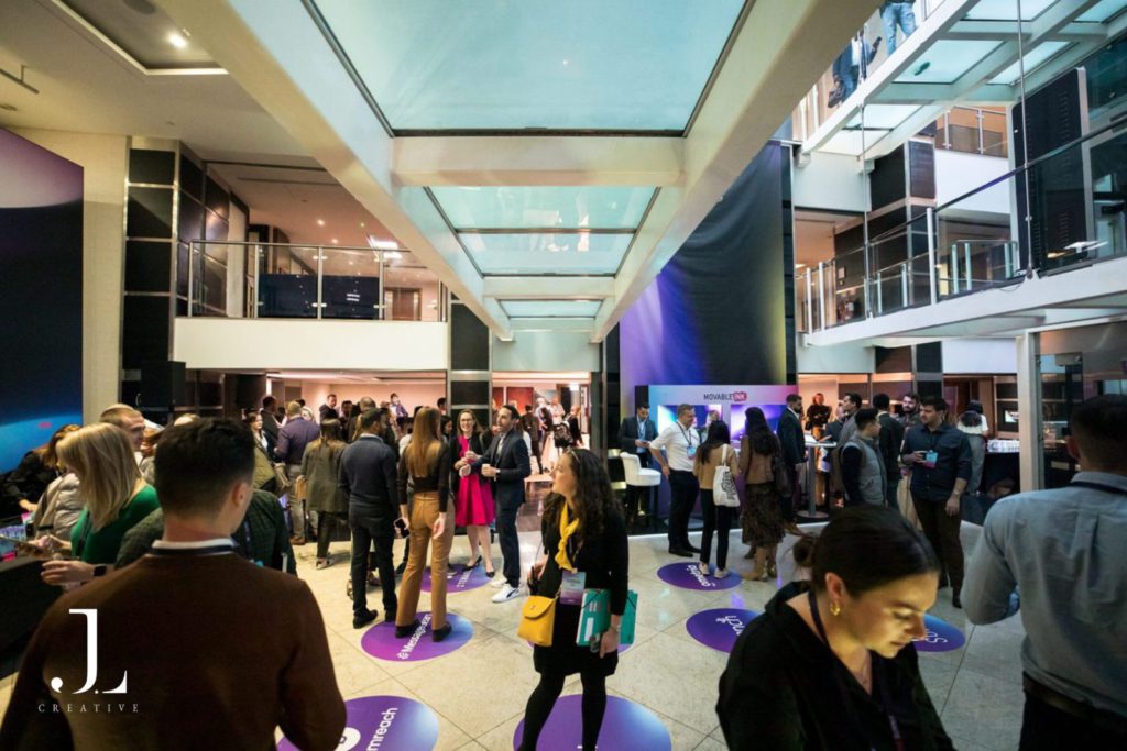 delegates networking at tech conference 