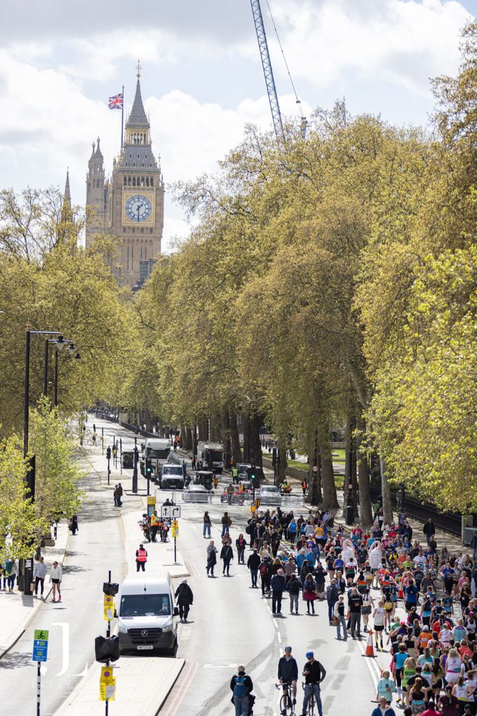 High-angle view of London Landmarks Half Marathon runners with Big Ben in the background.