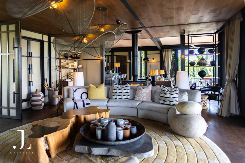 Elegant lodge lounge area with custom decor, shot for luxury hotel PR photography in the Okavango Delta.